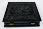 Mid-19th-century thermoplastic photographic case with ornate molded relief decoration and brass hinges