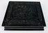 Closed Victorian Union case showing raised molded floral and geometric decoration on dark thermoplastic exterior