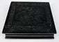 Closed Victorian Union case showing raised molded floral and geometric decoration on dark thermoplastic exterior