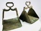 Antique pair of brass equestrian stirrups with triangular footrests