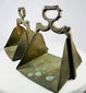 Brass horse stirrups with triangular footrest and guardian-themed design