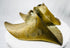 Spanish Colonial riding stirrups with warm aged patina and sculptural enclosed profile.