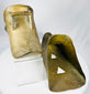 Antique Mexican or Latin American slipper stirrups with decorative Indigenous-inspired motifs.
