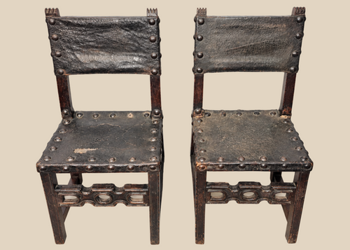 Pair of 17th-century Spanish Baroque walnut side chairs with leather upholstery