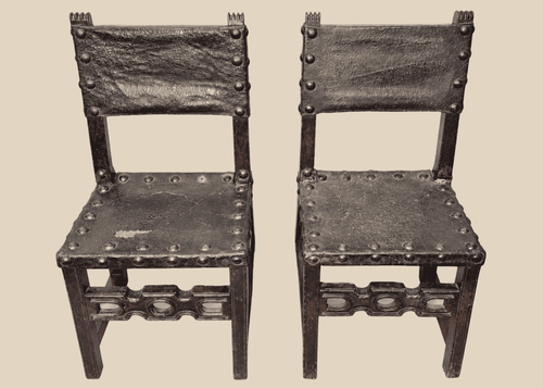 Pair of 17th-century Spanish Baroque walnut side chairs with leather upholstery
