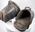 Historic European cavalry stirrups with arched iron hoods and reinforced wooden treads