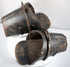 Front view of enclosed Spanish-style stirrups showing wooden footplates and protective hoods
