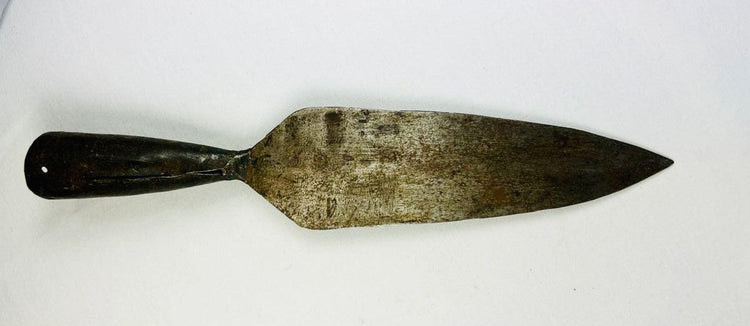 18th-century Indo-Persian forged iron spearhead with broad leaf-shaped blade, tapered socket, and aged patina.
