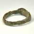 Profile view of Roman bronze ring showing solid cast construction and broad angular hoop