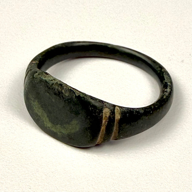 Close detail of incised shoulder decoration on ancient Roman bronze finger ring from the Eastern Mediterranean
