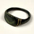 Close detail of incised shoulder decoration on ancient Roman bronze finger ring from the Eastern Mediterranean