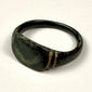 Close detail of incised shoulder decoration on ancient Roman bronze finger ring from the Eastern Mediterranean