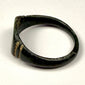 Ancient Roman bronze ring with substantial oval bezel, worn surface, and preserved archaeological patina