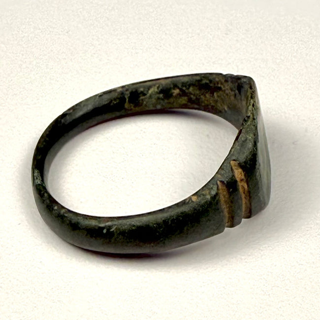 US size 9 ancient Roman bronze ring with complete hoop, wide bezel, and naturally developed green patina