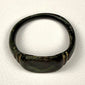 Detail view of Roman Imperial bronze finger ring showing surface pitting, oxidation, and mineral encrustation