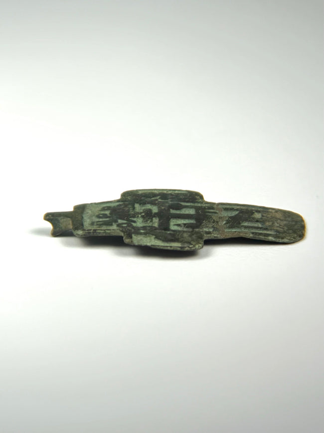 Early 19th century Russian Orthodox wearable cross with worn top suspension lug, dark patina, and traces of original enamel.
