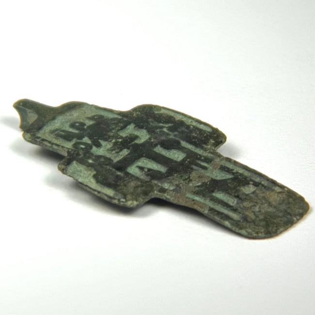 Antique Russian Old Believer devotional cross measuring 2 inches high, with Cyrillic panels, champlevé enamel remains, and uncleaned patina.
