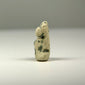 Late Period to Ptolemaic Egyptian faience cat amulet with upright ears, seated posture, and naturally weathered surface.
