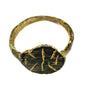 Ancient Byzantine bronze ring showing oval bezel with deeply engraved radiating linear motif