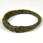 Roman Imperial bronze ring showing worn engraved palm-frond design on the flattened bezel