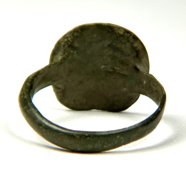 Rear view of Late Roman–Early Byzantine bronze finger ring showing solid bezel construction and circular band