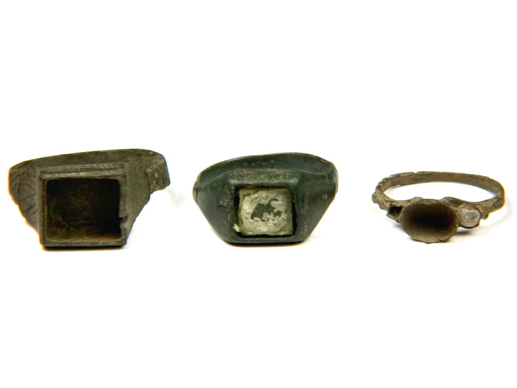 Ancient Roman and Byzantine bronze ring group showing three bezel rings and three simple finger bands from different angles