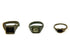 Three Late Roman to Early Byzantine bronze finger rings displayed side by side, featuring square bezel, inset signet and round bezel designs, circa 3rd–7th century CE