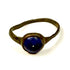 Ancient Roman bronze and blue glass finger ring displaying original surface wear and patina