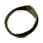 Ancient Roman jewelry ring in bronze with broad oval face and weathered archaeological surface