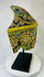 Polychrome Thai ceramic tile with vibrant multicolored patterns