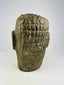 Polynesian ancestor effigy head carved in basalt, displayed against a neutral background.