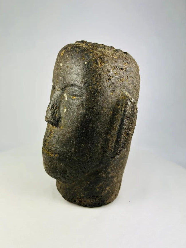 Three-quarter angle of an 18th–19th century Polynesian ancestor head carved from basalt.