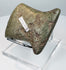 Reverse view of a Pre-Columbian ground stone tool from Ecuador or Peru with fully worked surfaces and archaeological collection markings.