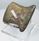 Reverse view of a Pre-Columbian ground stone tool from Ecuador or Peru with fully worked surfaces and archaeological collection markings.