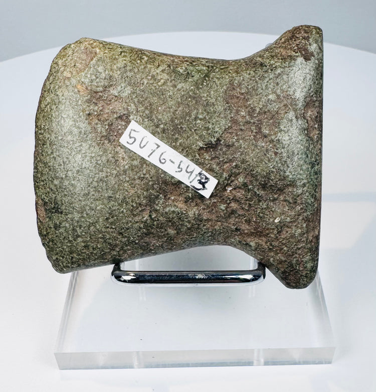 Pre-Columbian Andean notched stone axe from Ecuador or Peru, circa 500–1500 CE, with ground surface and archaeological number.