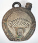 Pre-Columbian blackware flask with geometric patterns and sculptural detailing