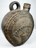 Pre-Columbian Andean flask with abstract relief motifs and worn ceramic surface