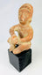 Nayarit/Jalisco Pre-Columbian terracotta funerary figure, circa 300 BCE–300 CE, seated pose, black display stand