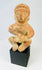 Hand-molded West Mexican terracotta figure with red slip, stylized anthropomorphic features, burnished surface