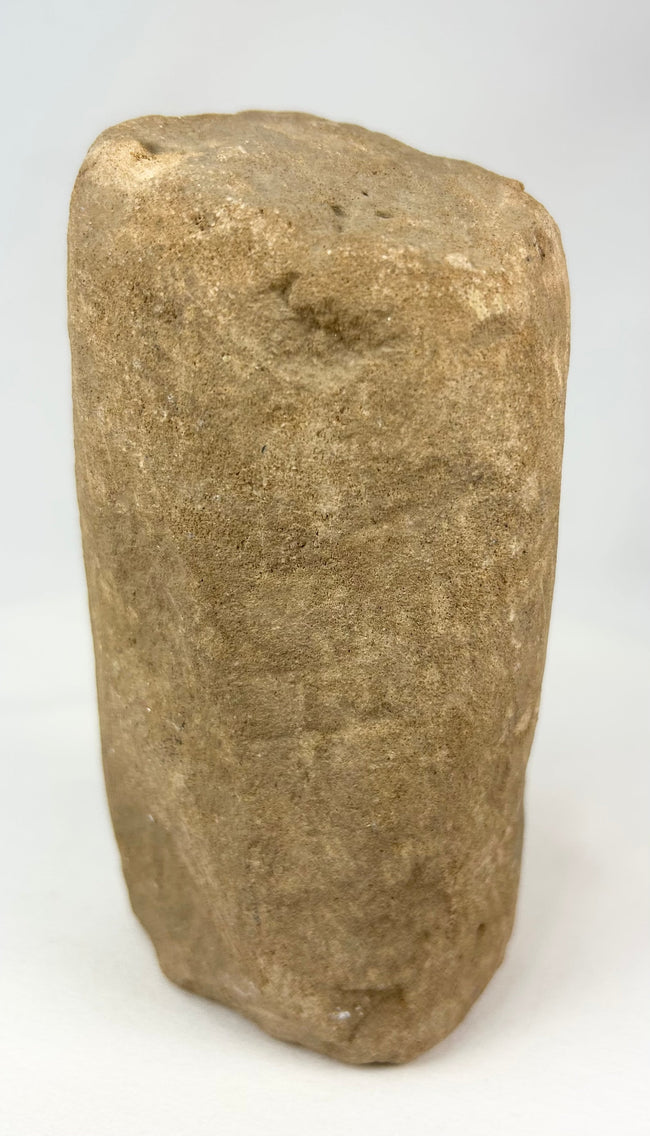 Ancient carved stone idol with minimalist anthropomorphic design, circa 500–1000 CE