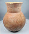 Underside of a Pre-Columbian earthenware vessel showing stabilized cracks and restoration