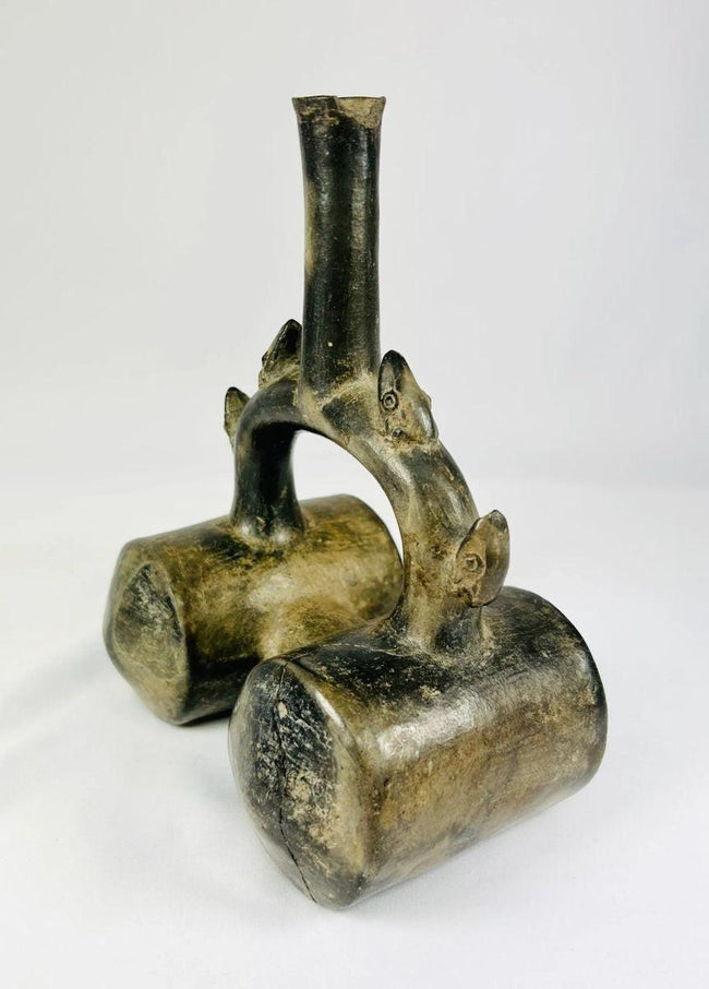 Pre-Columbian Peruvian stirrup vessel with dual spouts and fine finish