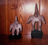 Period photograph of the two Ancient Pre-Columbian Colima Gingerbread terracotta figures displayed in the McMillan Collection during the 1980s