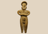 Pre-Columbian Colima terracotta female figure with folded arms and circular headdress, West Mexico, circa 300 BCE–300 CE.