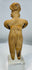 Pre-Columbian West Mexican terracotta female effigy with prominent ear ornaments and stylized facial features.