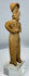 Ancient terracotta female effigy from Colima culture mounted for display on a custom lucite stand.