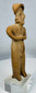 Ancient terracotta female effigy from Colima culture mounted for display on a custom lucite stand.