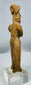 Pre-Columbian West Mexican terracotta woman figure with almond-shaped eyes and prominent nose.