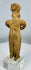 Colima gingerbread-style terracotta figure depicting a standing female with folded arms.