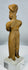 West Mexico terracotta fertility figure with warm earthen patina and expressive stylized features.